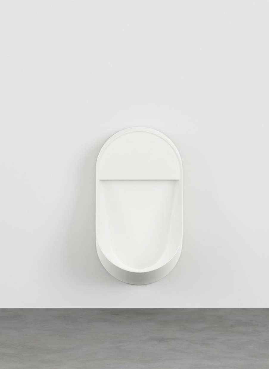 Urinario suspendido de diseño italiano blanco con forma ovalada compacta