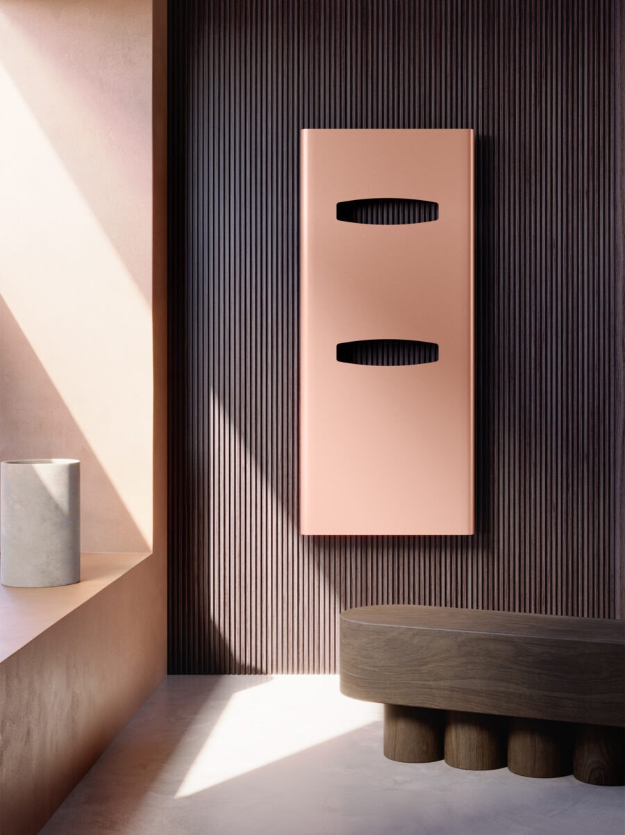 Radiador de diseño italiano modelo Mask en tono rosa para ambiente minimalista